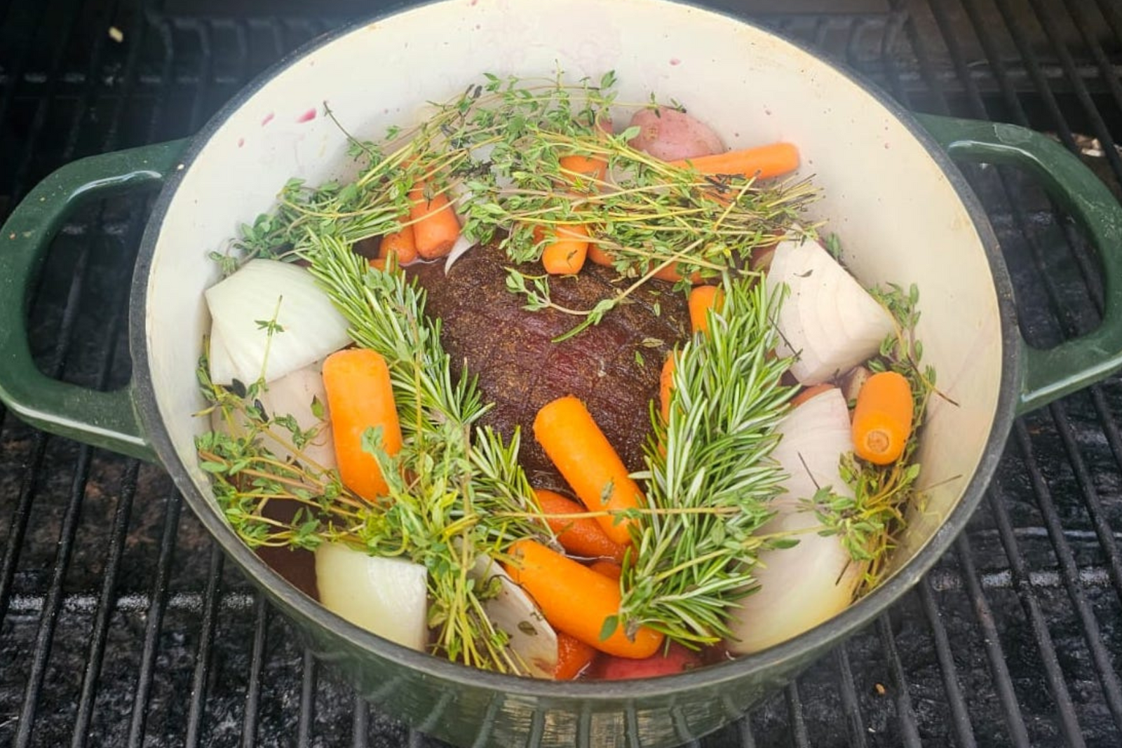 smoked ostrich tip in a dutch oven