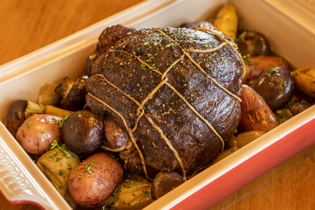 Cooked ostrich tip roast with medley of vegetables