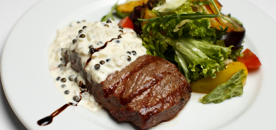 ostrich steak with peppercorn gravy