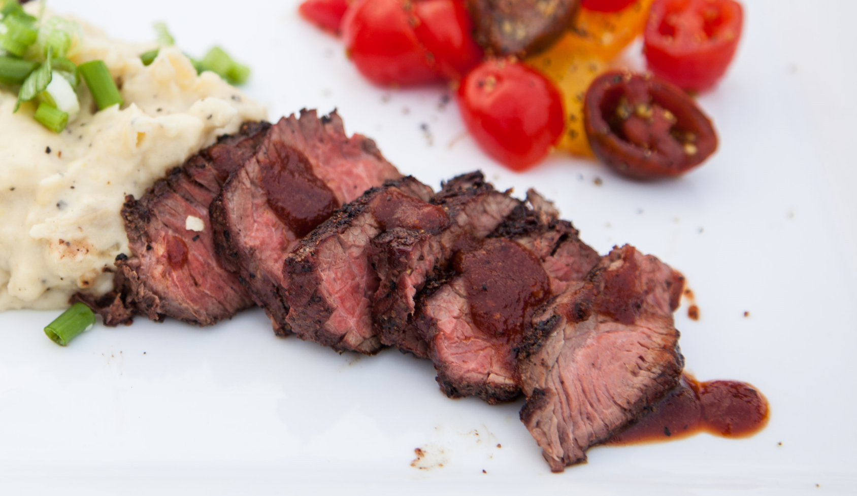 grilled, sliced ostrich steak