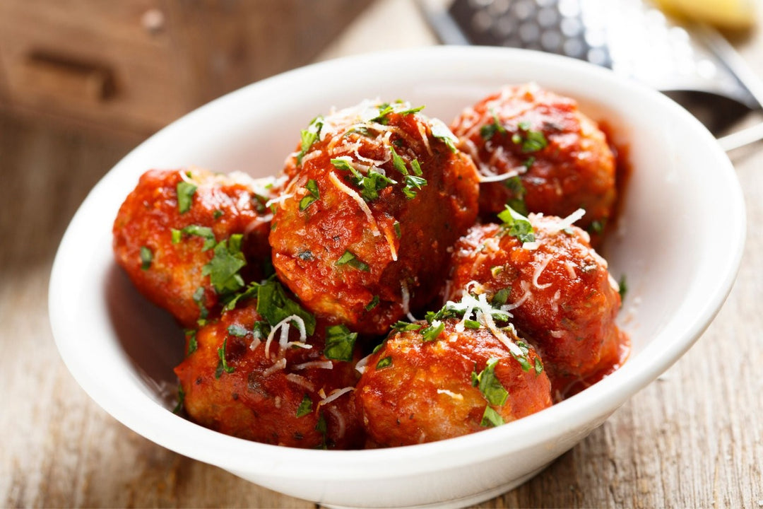 bowl of ostrich meatballs in marinara