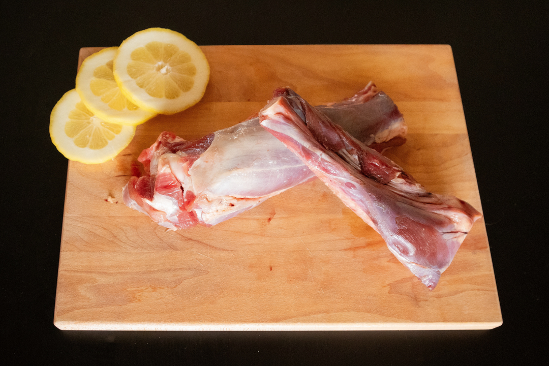 raw ostrich wings cooked with lemon and seasoning 