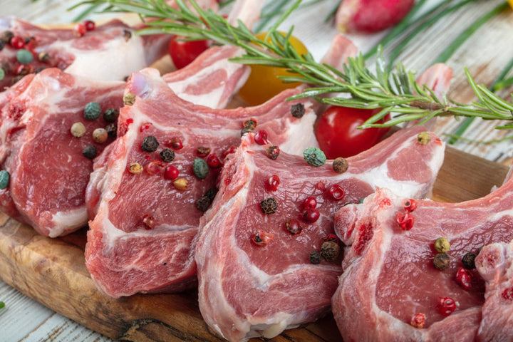 raw lamb loin chops with seasonings